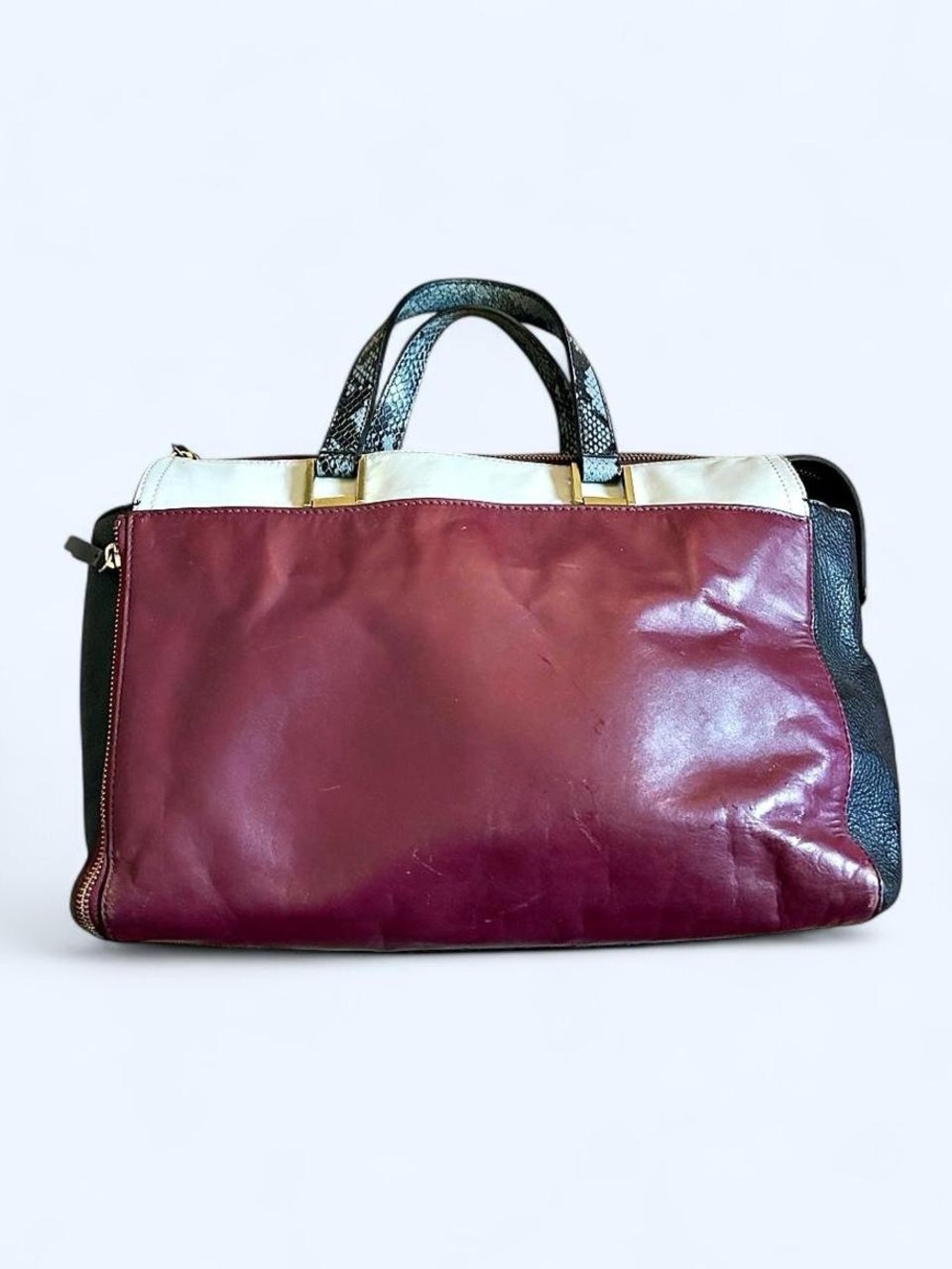 Quiet luxury Pour La Victoire "Etage" Satchel in raspberry.
